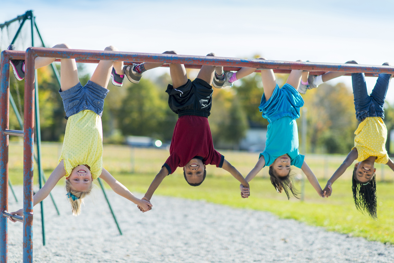 Children playing on climbing frame